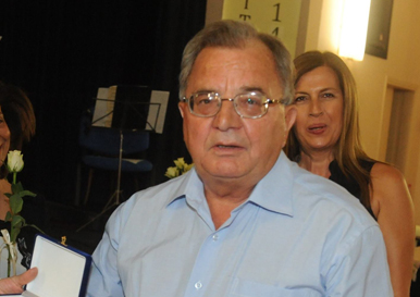 Θ.ΡΑΟΥΖΑΙΟΣ